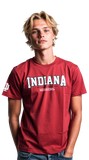 Person wearing a red 'Indiana Hoosiers' t-shirt on a white background