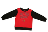 Red and black Louisville Cardinals sweatshirt on a green background