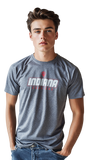 Person wearing a gray t-shirt with 'Indiana' printed on it against a white background